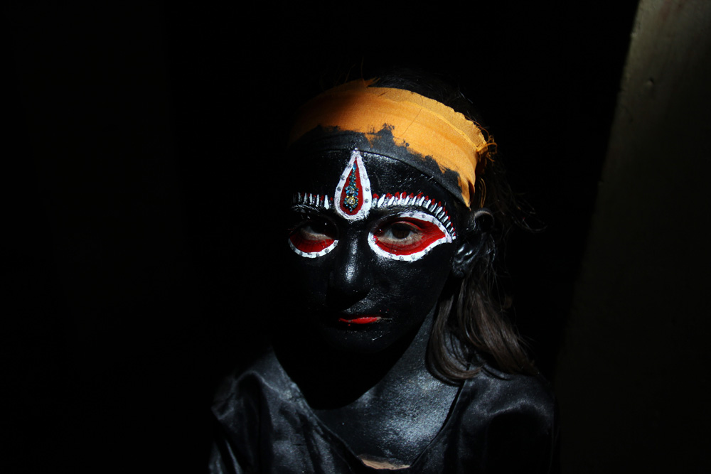 An Indian girl dressed as Hindu Goddess, Kali prepares to take part in a religious procession taken out on the occasion of Ramnavmi festival in Amritsar, India, 19 April 2013. The festival commemorates the birth of Hindu God Lord Rama.