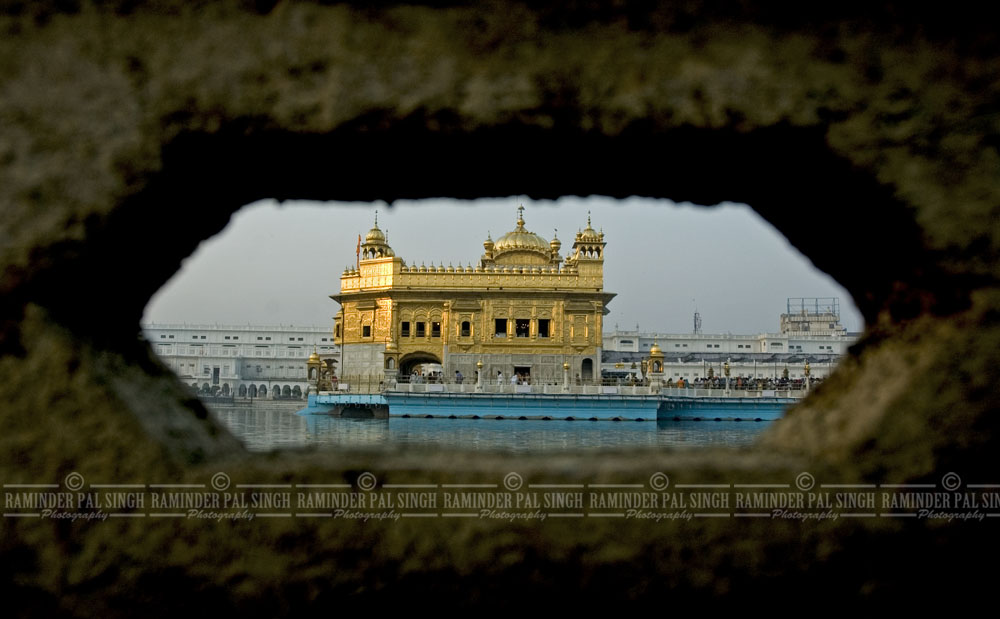 Unique photo Golden Temple through a vent