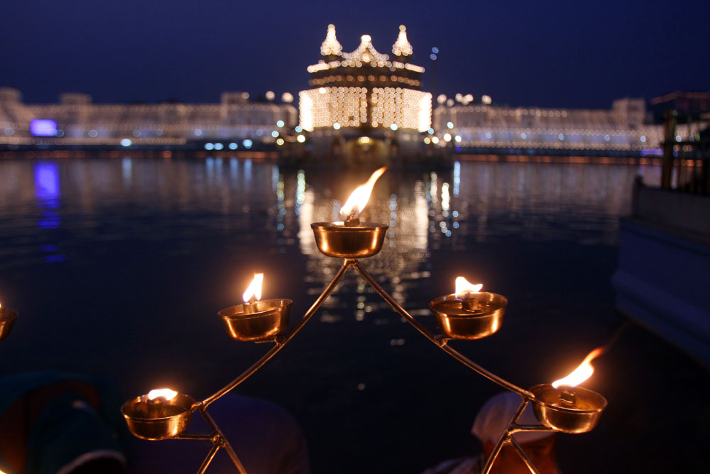 Lamp stand at night at Golden Temple