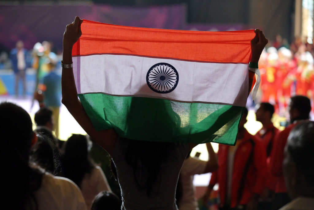 Indian fan with Indian flag Asian Games 2018 Jakarta Indonesia arms up cheering