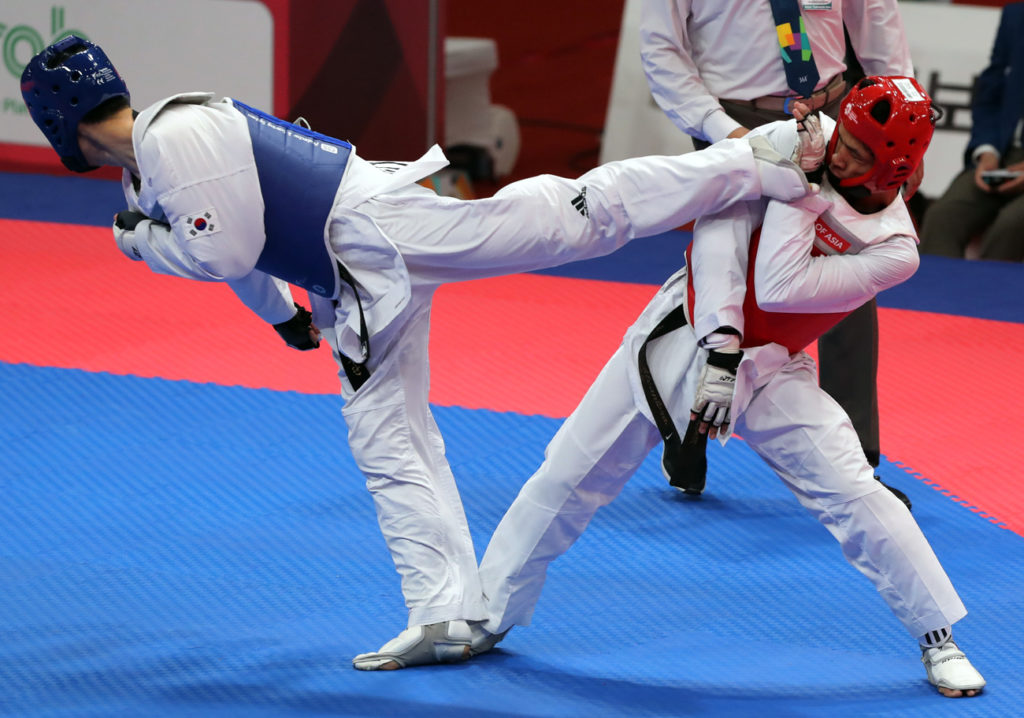Taekwondo Asian Games action shot photograph photography hit shot image