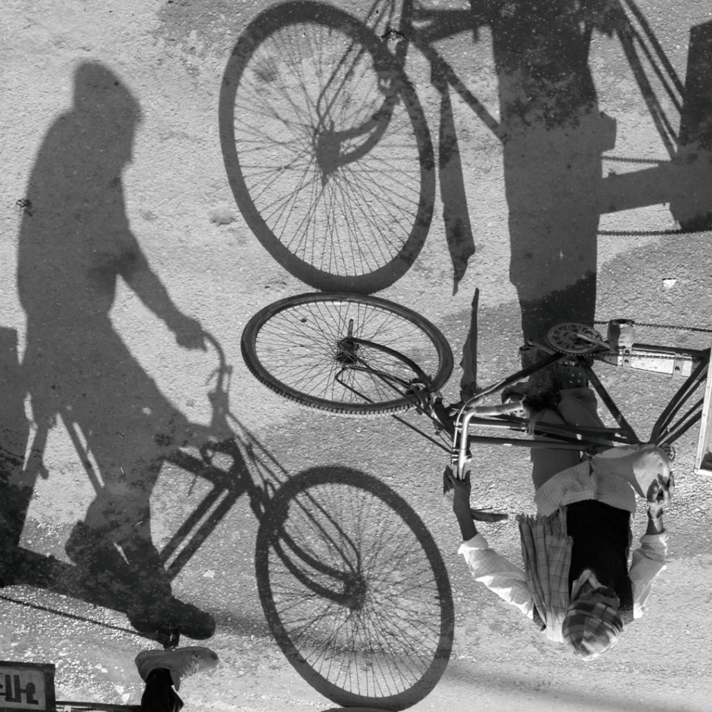 rickshaw and wheel shadows inverted