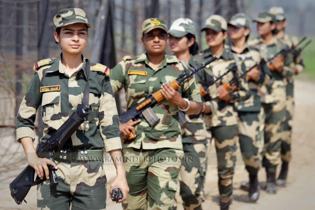 India Border Security Force BSF women contingent patrols along the border fence in Attari Wagha border sector