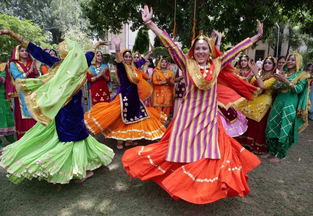 beautiful Indian Punjabi women smiling teej festival celebrationsbeautiful Indian Punjabi woman portrait smiling teej festival beautiful eyes
